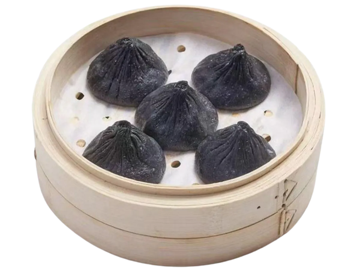 Black squid ink soup dumplings in bamboo steamer at Hui Jiang Nan Dumpling Eatery, a Dumpling Restaurant in MN