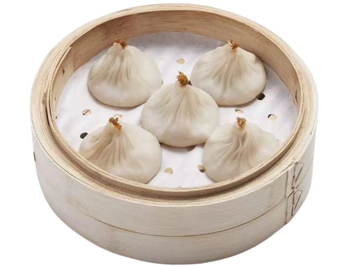 White crab roe top soup dumplings in bamboo steamer at Hui Jiang Nan Dumpling Eatery, a Dumpling Restaurant in MN